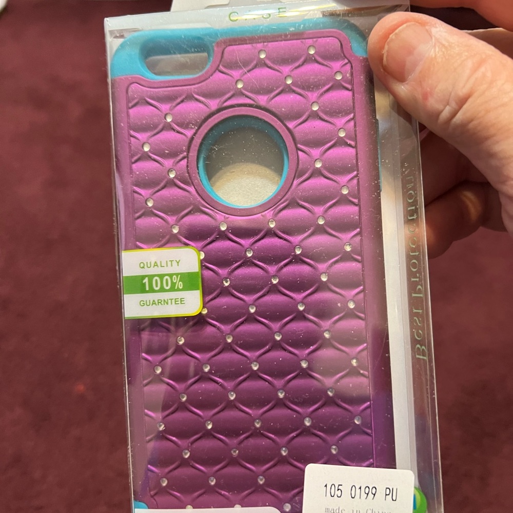 IPhone 6 Plus phone cover , pretty color kind of has a quilted look purple !